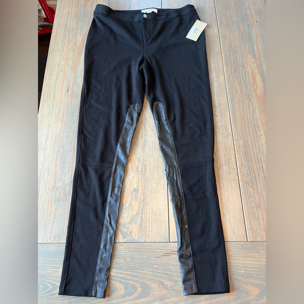 Black Michael Kors leggings.